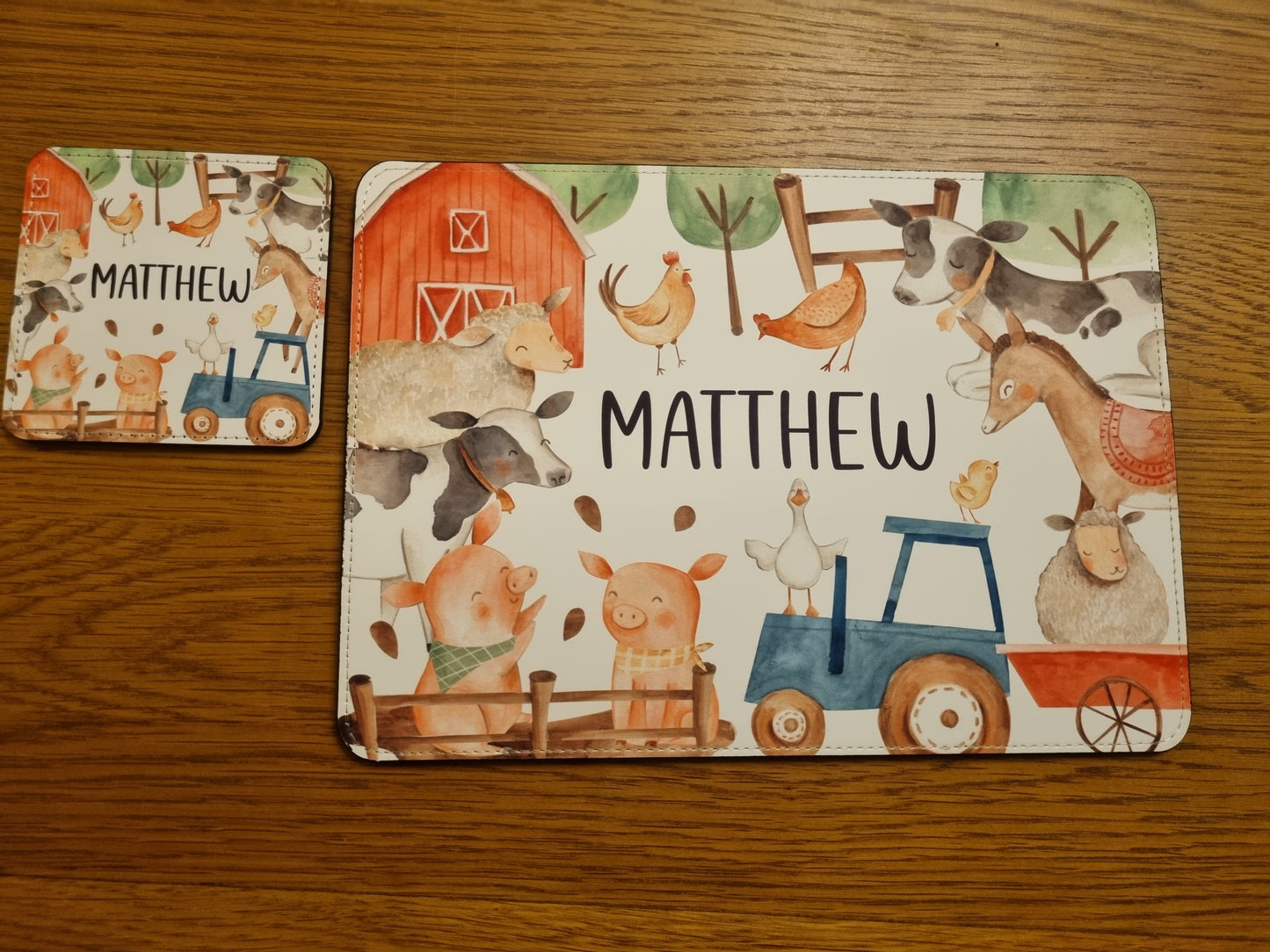 Children's placemat set. Personalised with a name. Farm animals theme.
