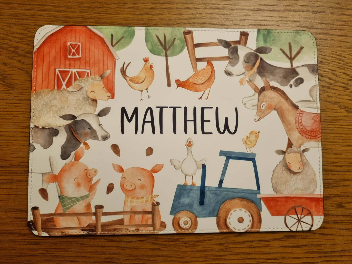 Children's placemat set. Personalised with a name. Farm animals theme.