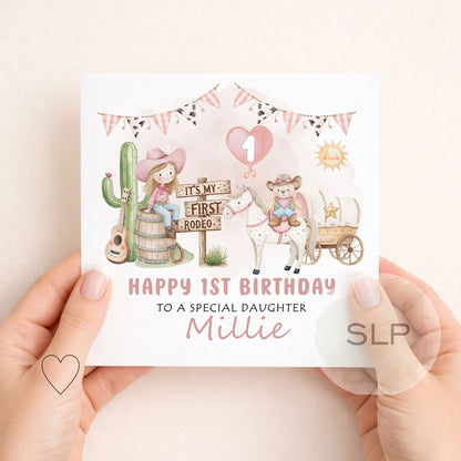 Personalised first rodeo 1st birthday card for a special girl. Cute pink cowgirl, pony and western design personalised with her name and relationship.