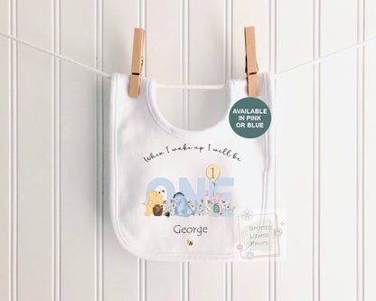 Personalised 1st birthday baby outfit available in pink or blue. Add their name and choose a first birthday bib, baby vest or sleepsuit for their special day.