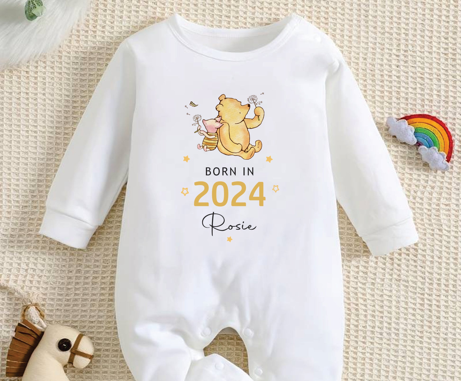 Born in 2024 personalised with a name baby sleepsuit with winnie the pooh