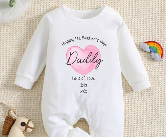 our first fathers baby baby romper with pink heart