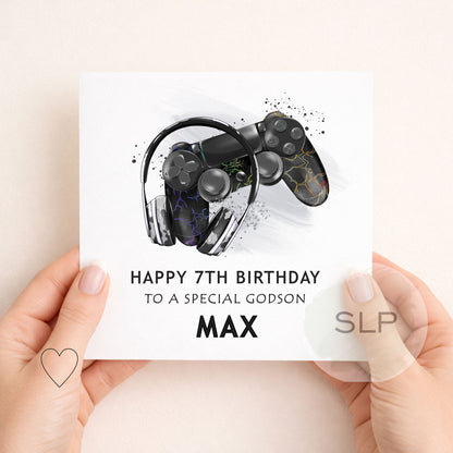 Personalised black gaming birthday card with controller and headphones. Add any age, name and relationship for a unique gamer birthday card.