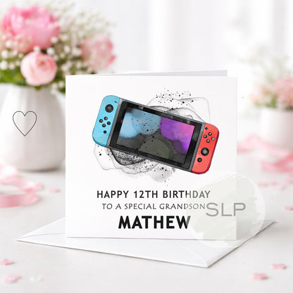 Personalised handheld gaming birthday card with colourful console design. Add any age, name and relationship for a unique gamer birthday card.