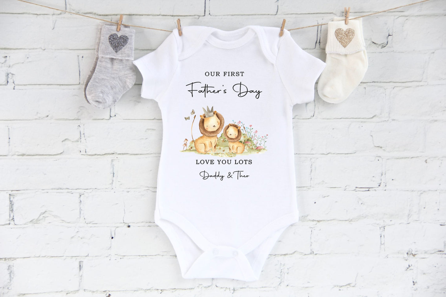 our first fathers day baby vest