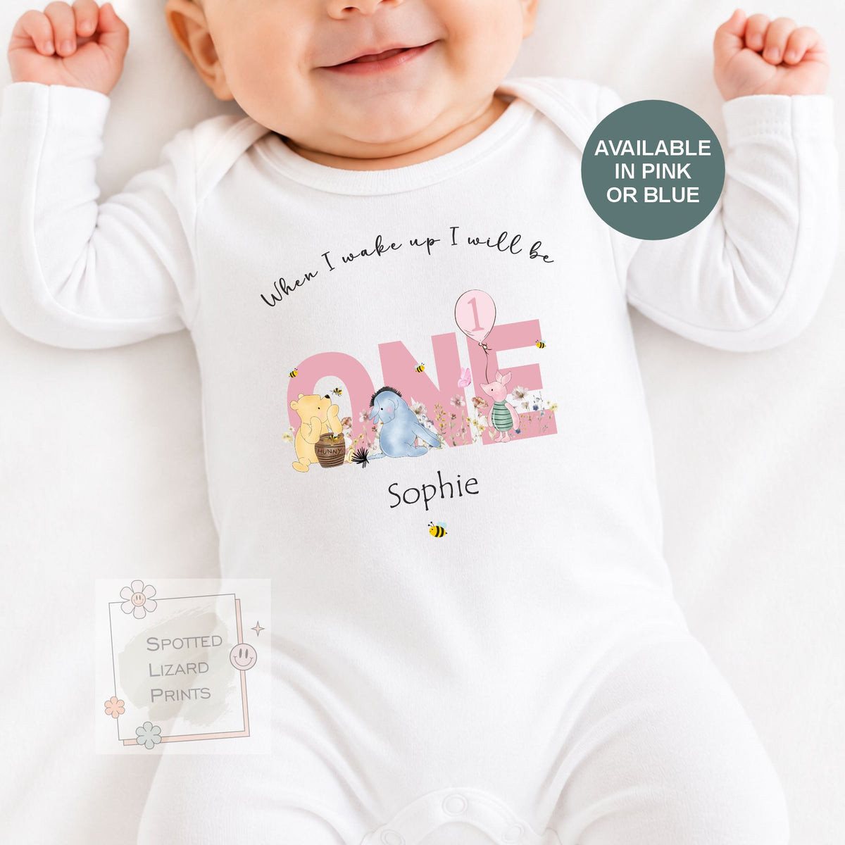 Personalised 1st birthday baby outfit available in pink or blue. Add their name and choose a first birthday bib, baby vest or sleepsuit for their special day.