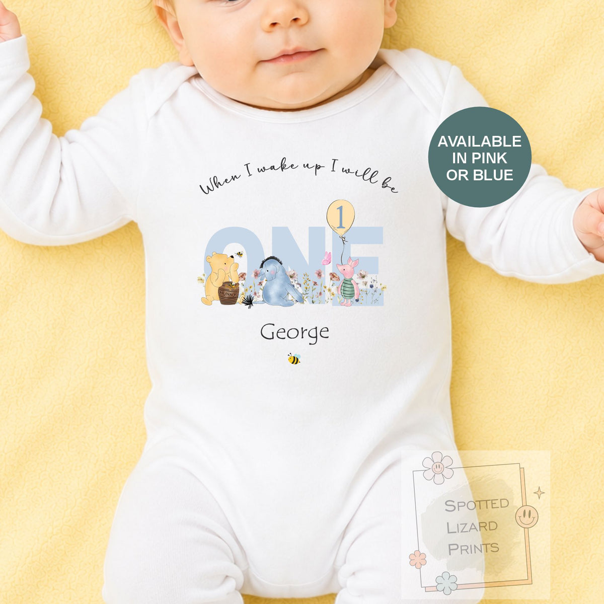 Personalised 1st birthday baby outfit available in pink or blue. Add their name and choose a first birthday bib, baby vest or sleepsuit for their special day.