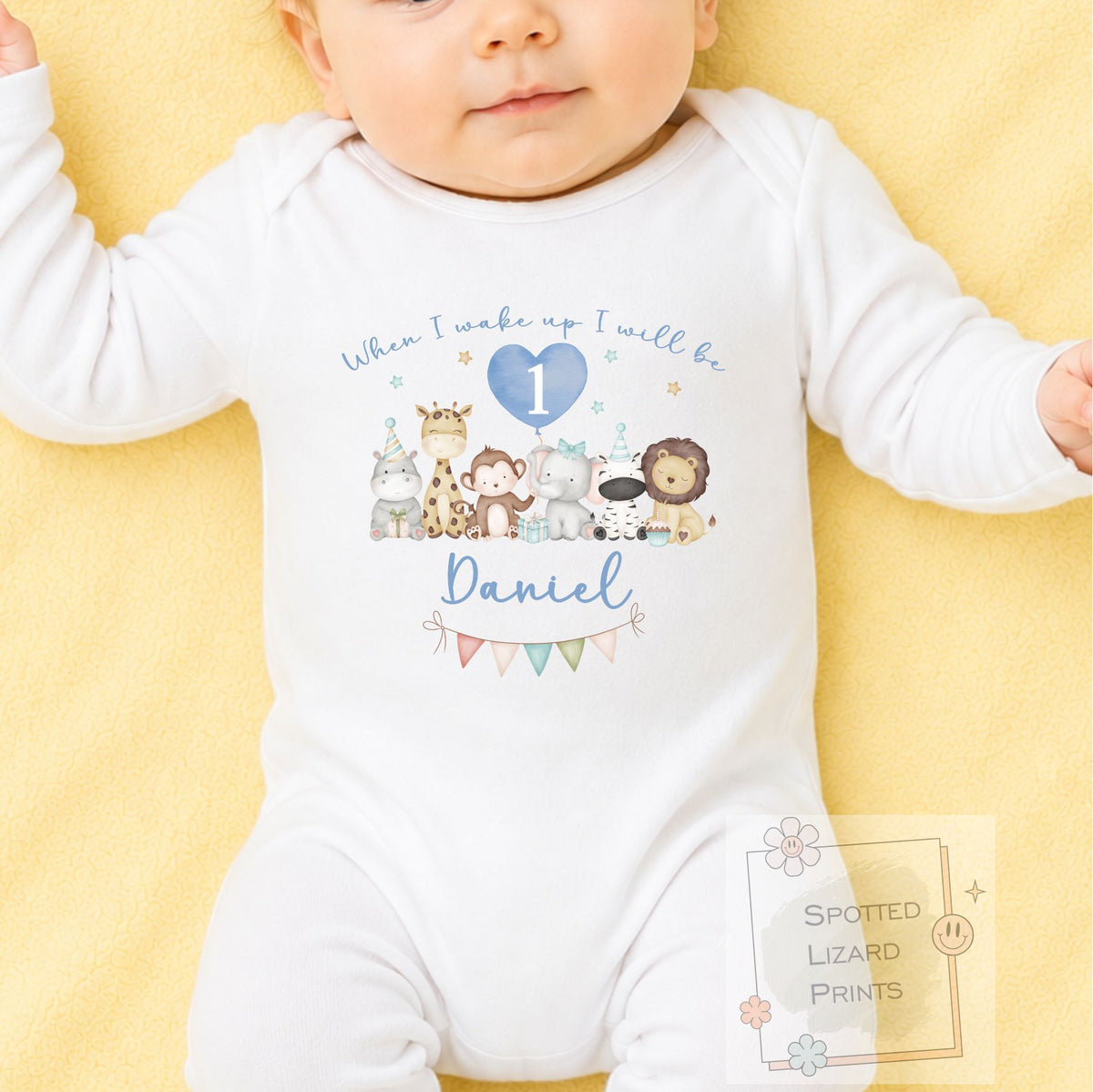 Personalised 1st birthday baby outfit with cute safari animals and custom name. Choose a bib, baby vest or sleepsuit for their special first birthday