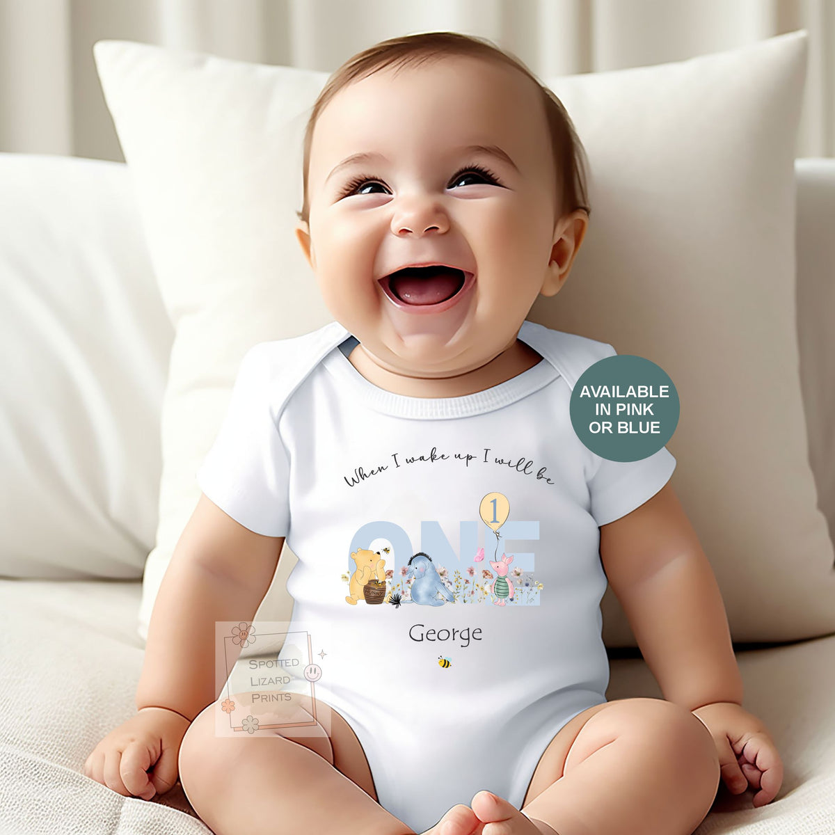 Personalised 1st birthday baby outfit available in pink or blue. Add their name and choose a first birthday bib, baby vest or sleepsuit for their special day.