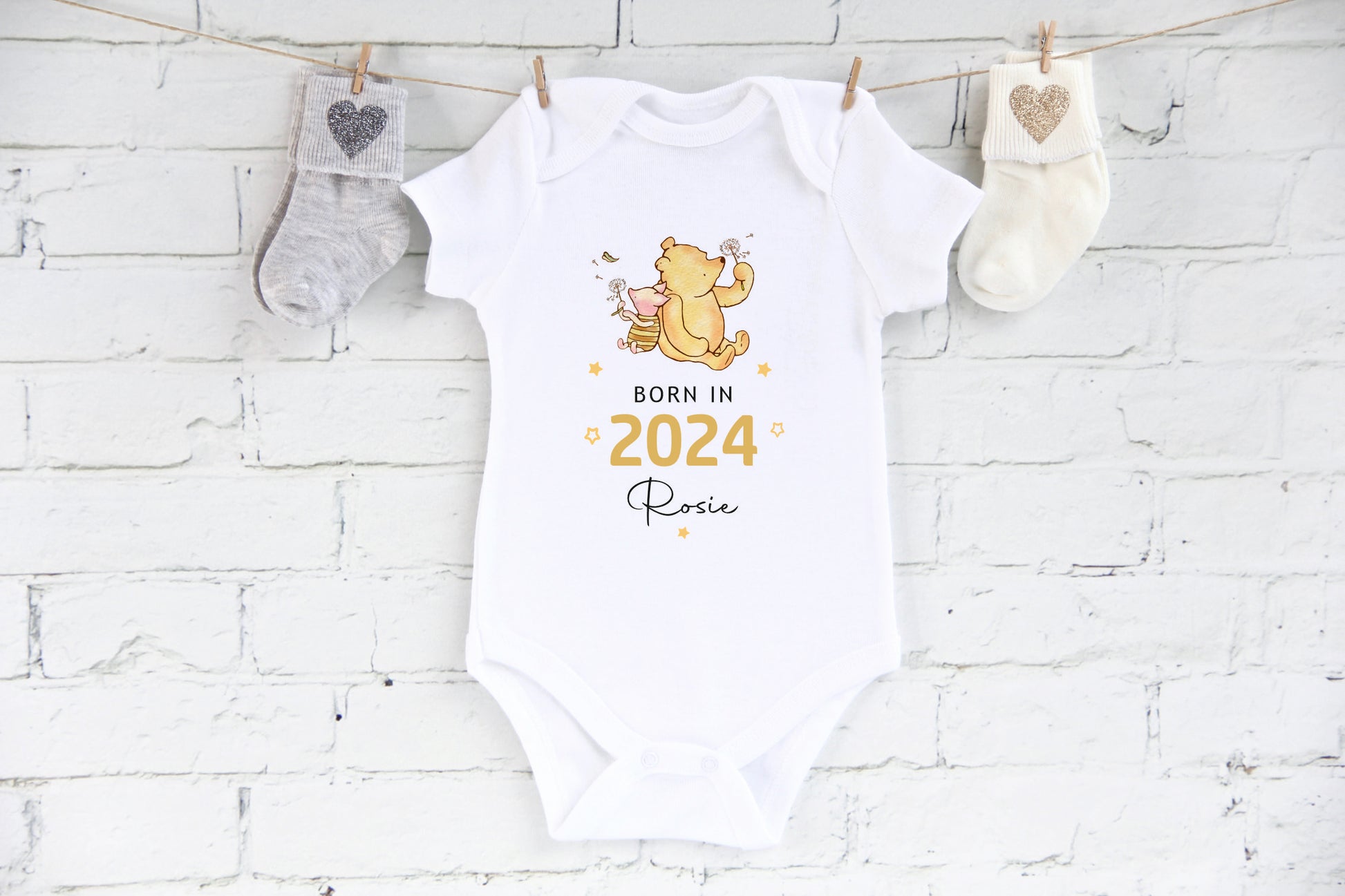 Born in 2024 personalised with a name baby vest with winnie the pooh