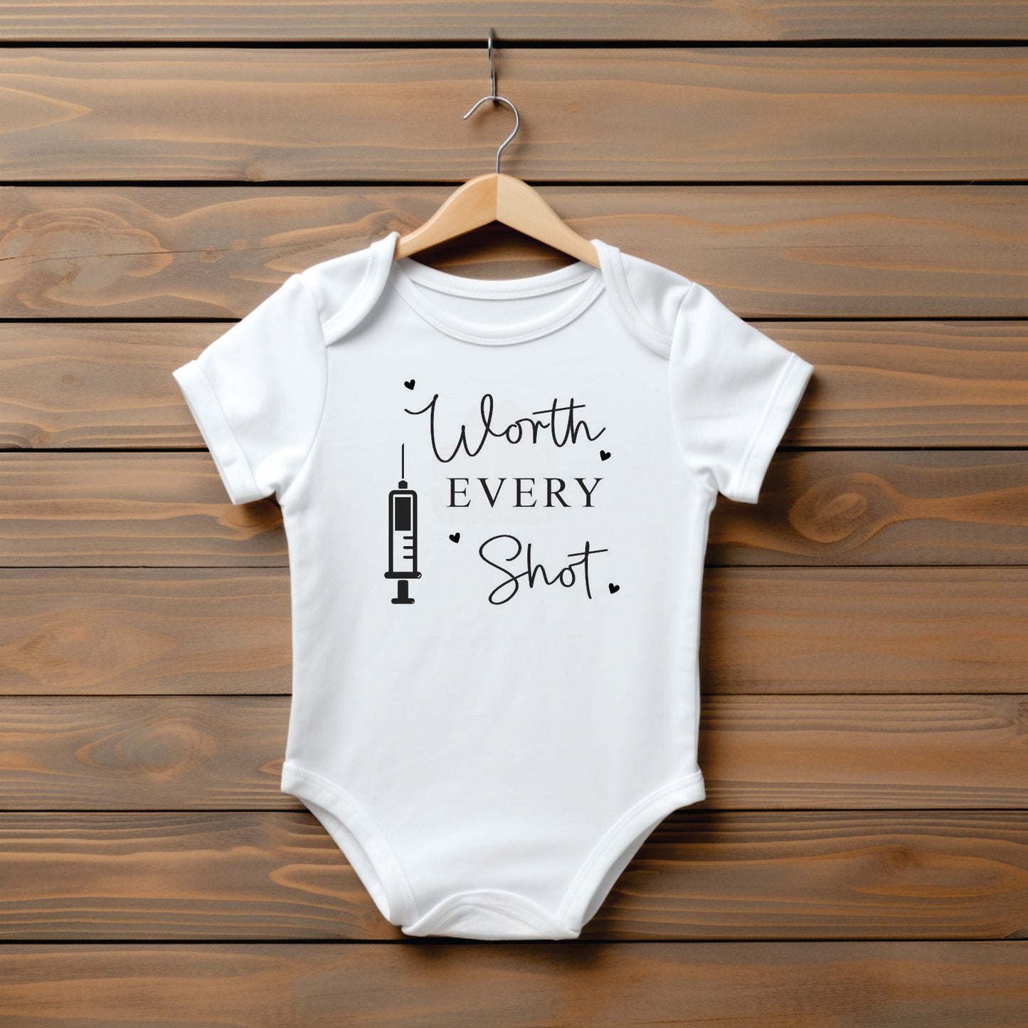 Worth every shot IVF baby vest pregnancy announcement